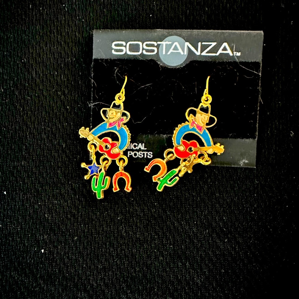 Cute earrings. Four different pieces included. Earrings and pins as shown.